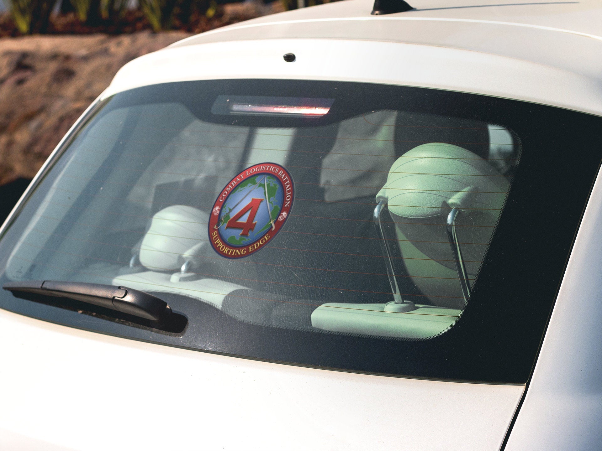 a car with a sticker on the back window