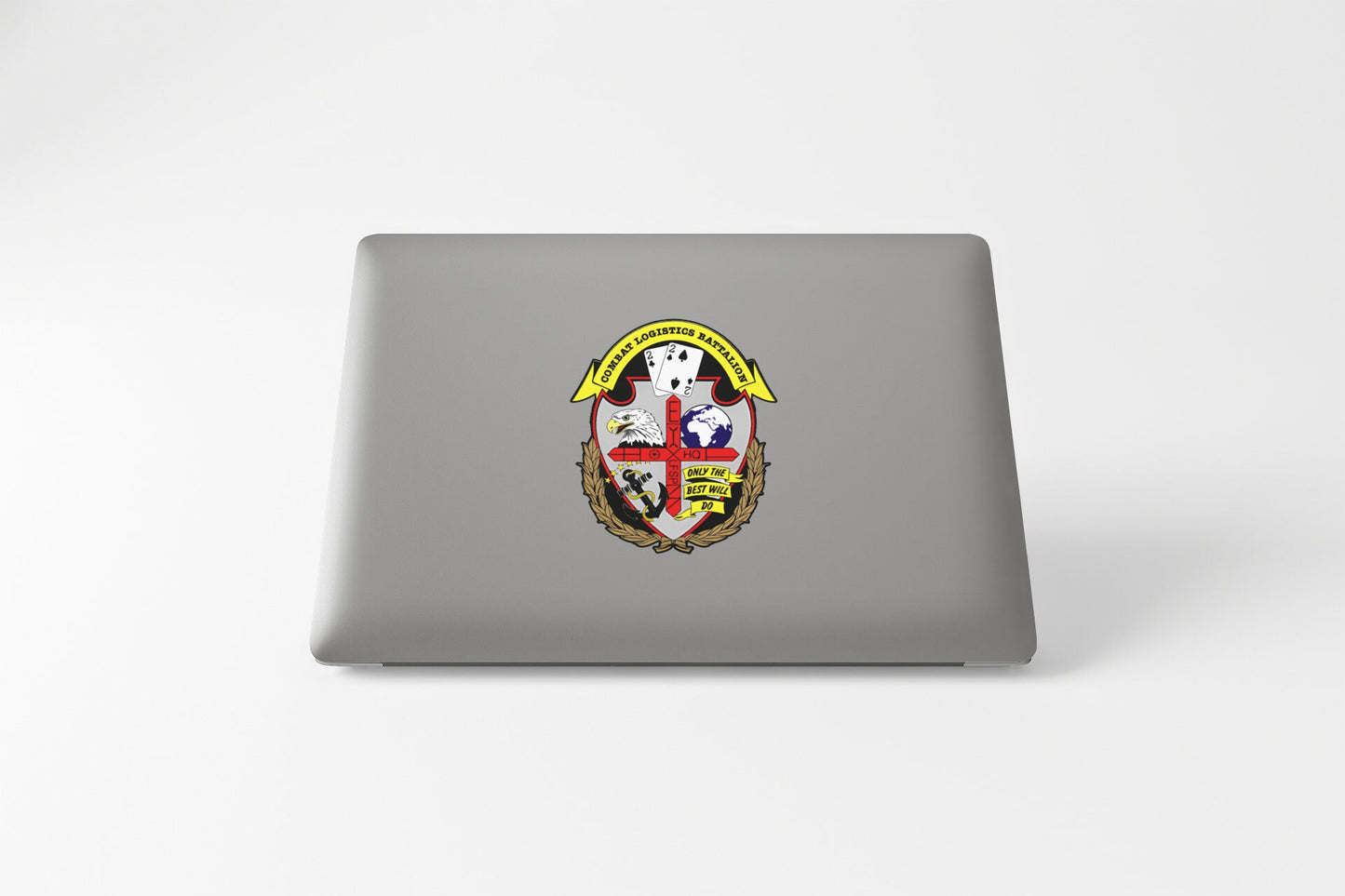 a laptop computer with a coat of arms on it