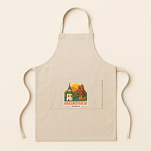 A beige apricot with a graphic design depicting a Russian landmark, specifically the Krasnoyarsk railway station, printed on it.