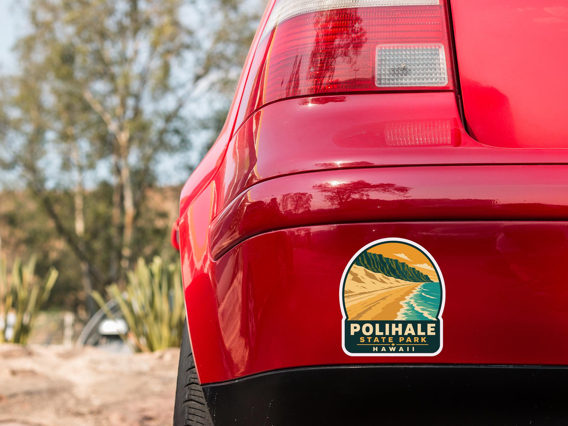 the rear end of a red car with a sticker on the back window that reads "POLIHALE STATE PARK HAWAII".