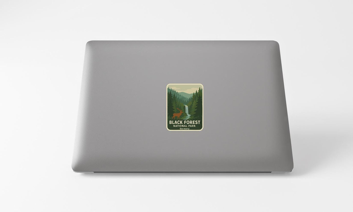 A sticker on the back of a laptop that says "BLACK FOREST NATIONAL PARK".
