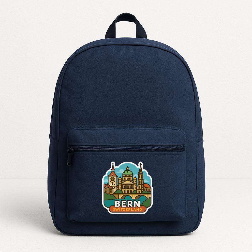 A navy blue backpack with a sticker depicting Bern, Switzerland.