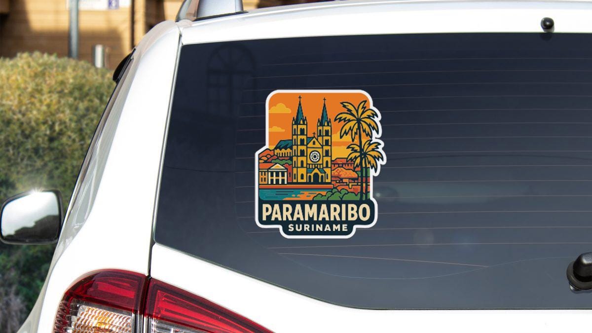 A sticker on the rear window of a white car, depicting a cityscape with palm trees and a church.