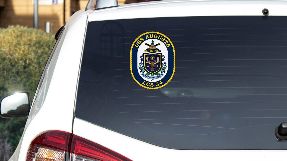 a car with a sticker on the back of it