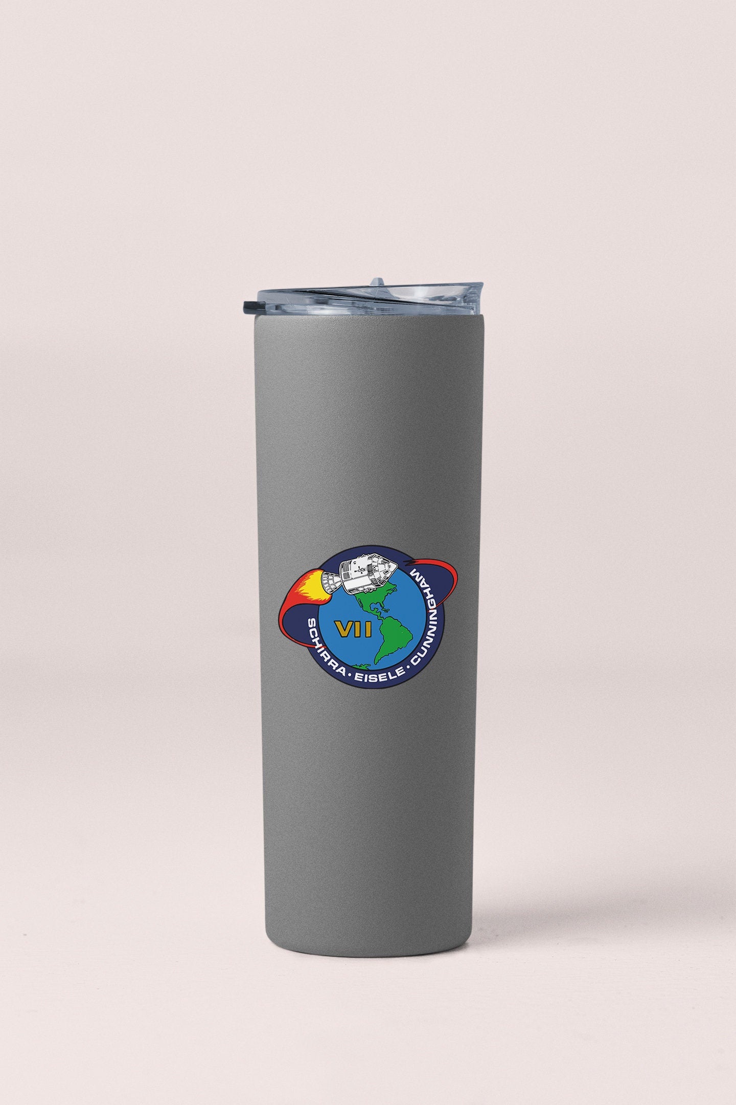 a stainless steel tumbler with a nasa emblem