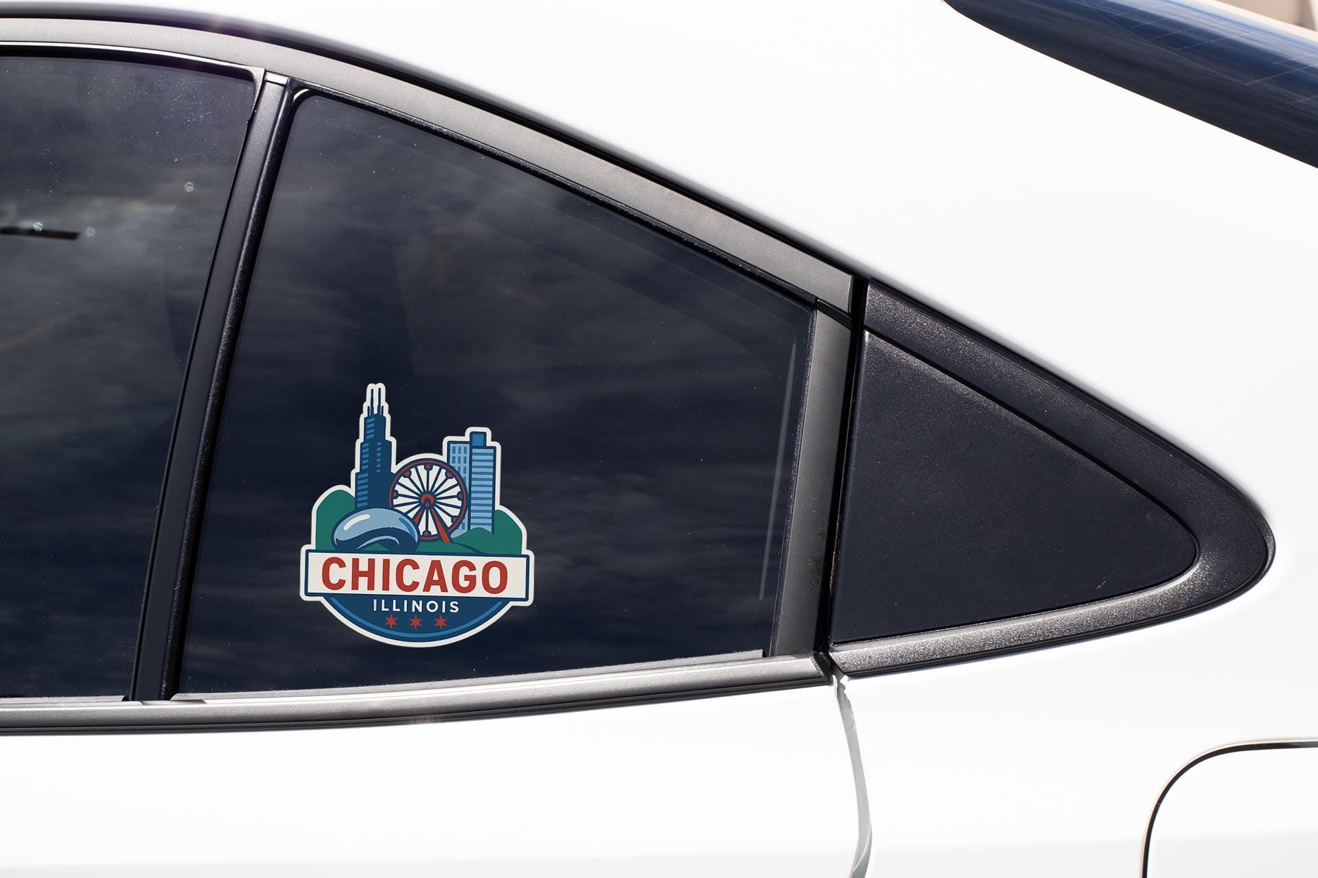 a chicago skyline sticker on the side of a car
