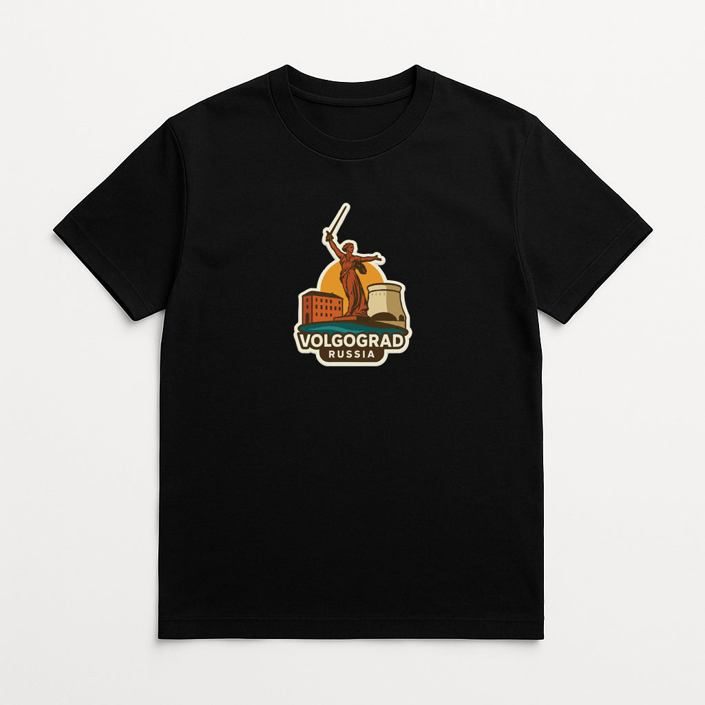 A black t-shirt with a graphic design featuring a figure holding a flag and the text "VOLGOGRAD RUSSIA" printed on it.