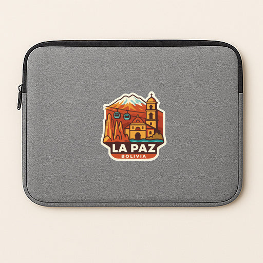 A gray laptop sleeve with a sticker depicting a landmark in Bolivia.