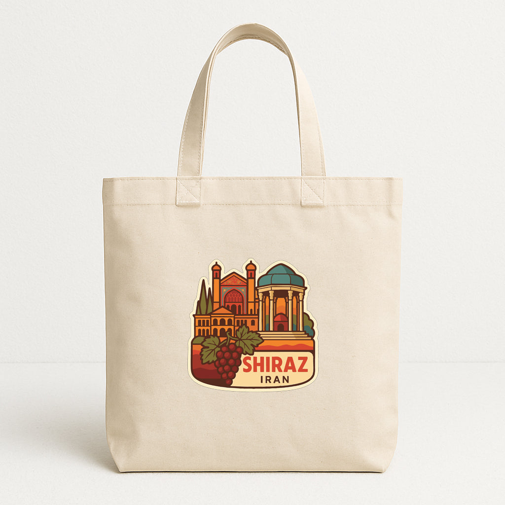 A beige tote bag with a printed illustration of a cityscape and the text "SHIRAZ IRAN" printed on it.
