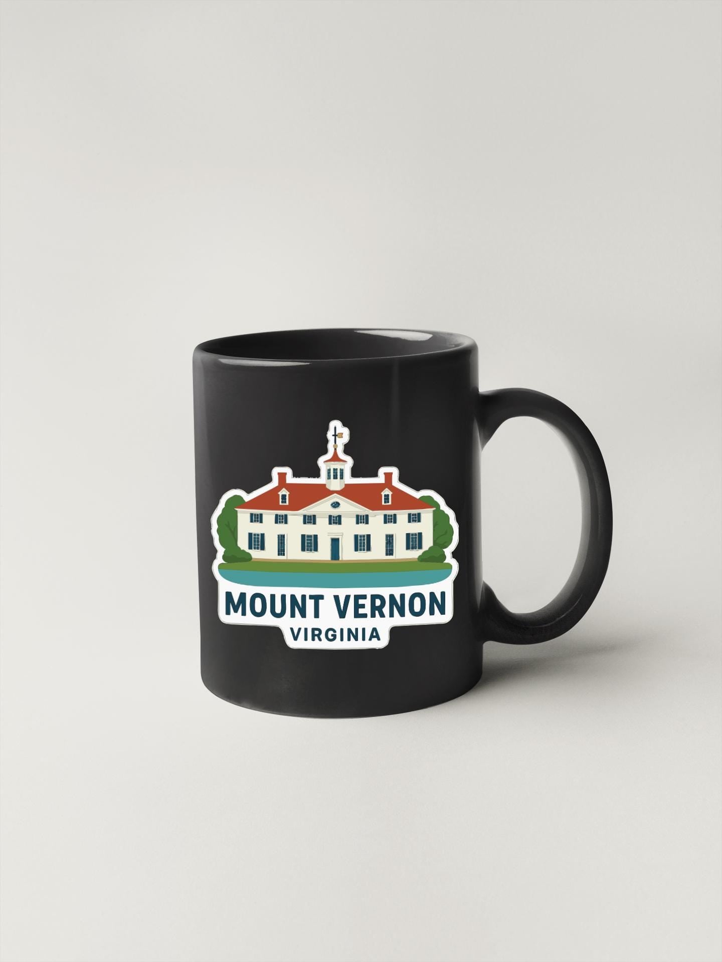 A black coffee mug with a graphic of Mount Vernon, a historic mansion in Virginia, and the text "Mount Vernon, Virginia" printed on it.