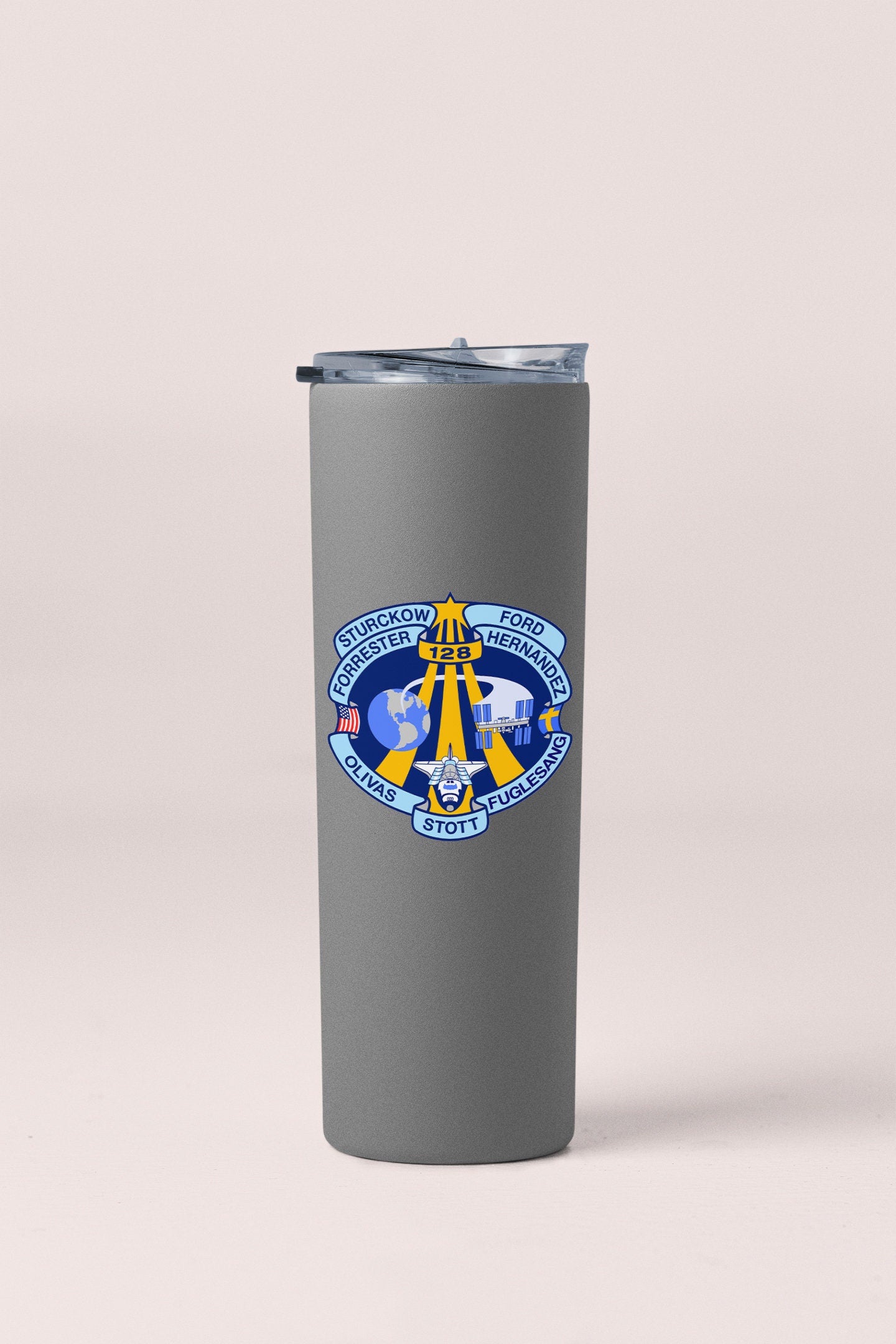 a gray travel mug with a yellow and blue logo