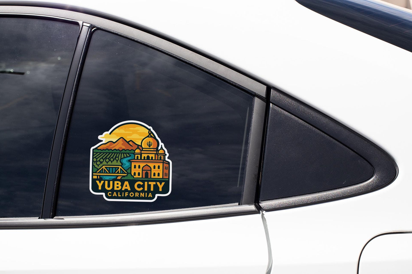 A sticker on the side of a car window that says "Yuba City, California".