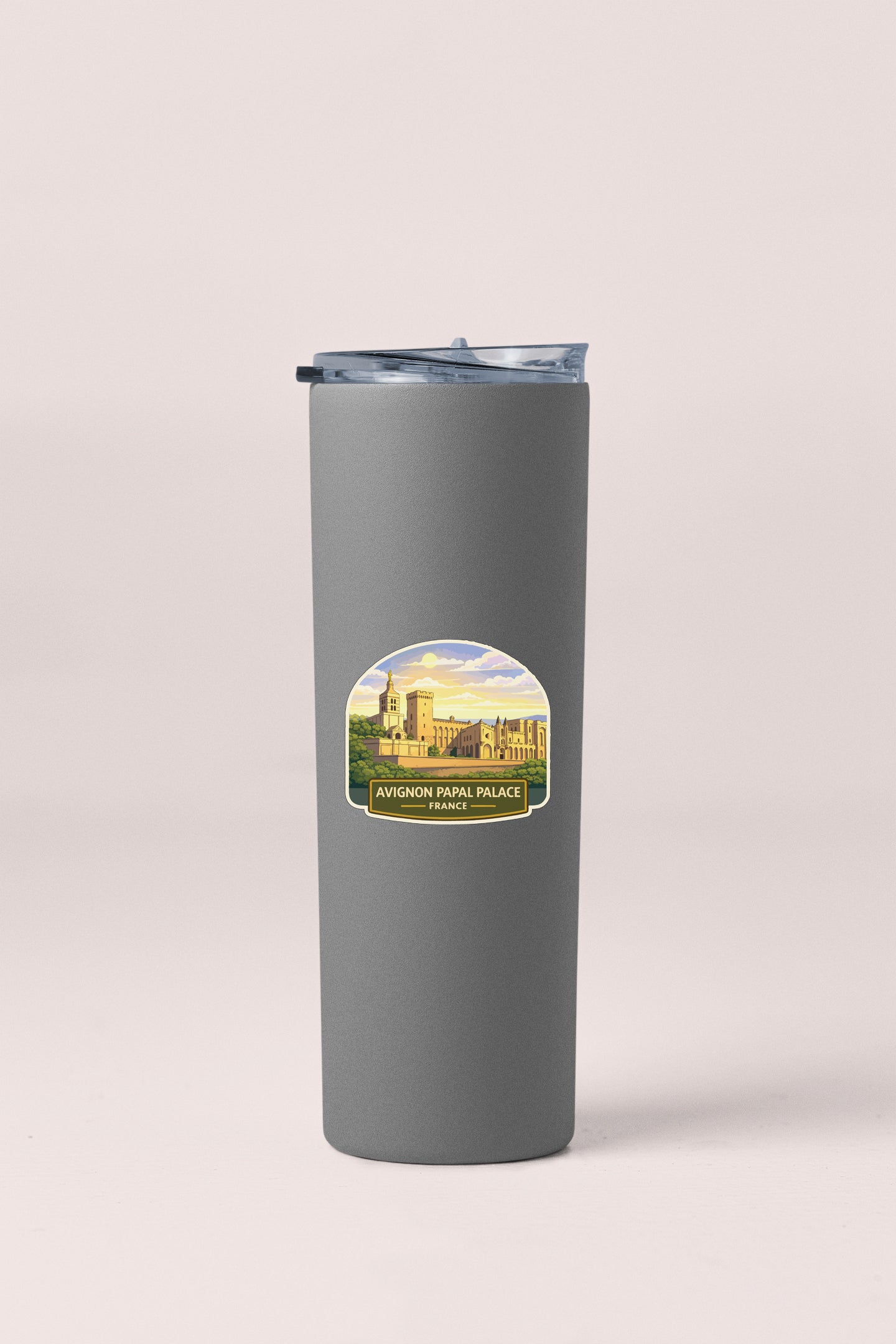A gray insulated tumbler with a label that says "AVENON PARAPALLE" and "FRANCE" printed on it.