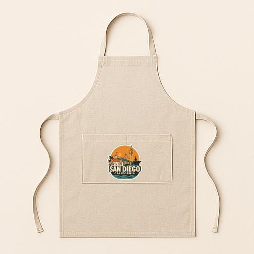 A beige apricot with a graphic of San Diego printed on it.