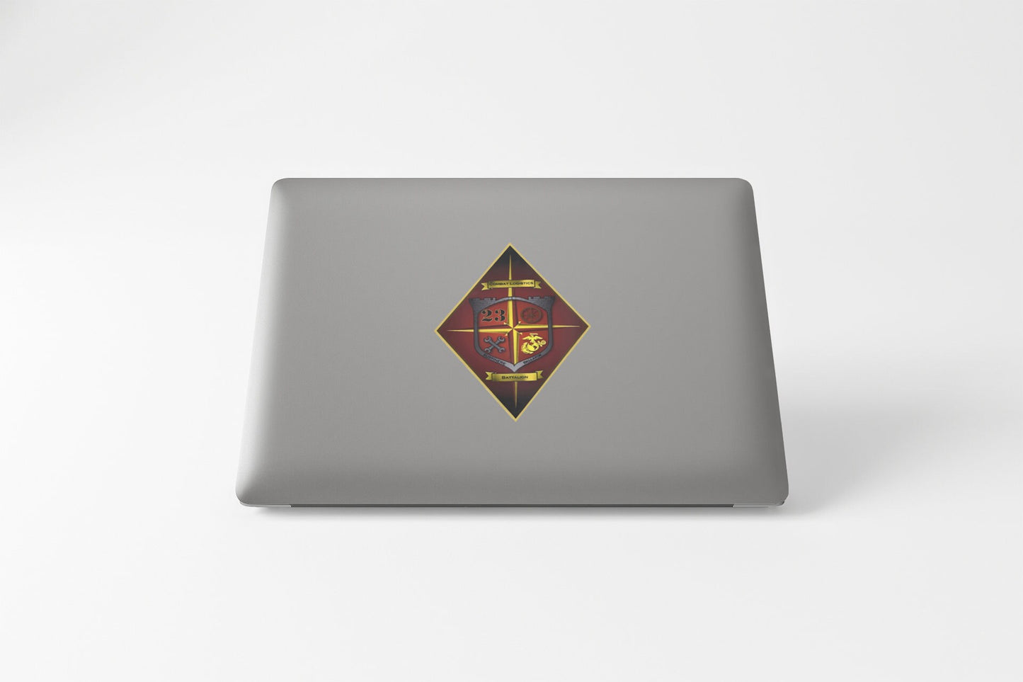 a laptop with a picture of a cross on it