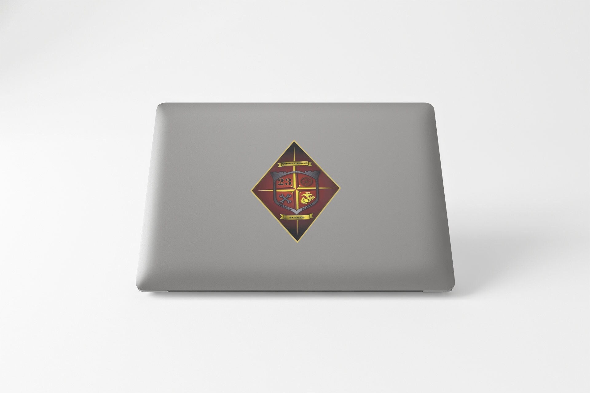 a laptop with a picture of a cross on it