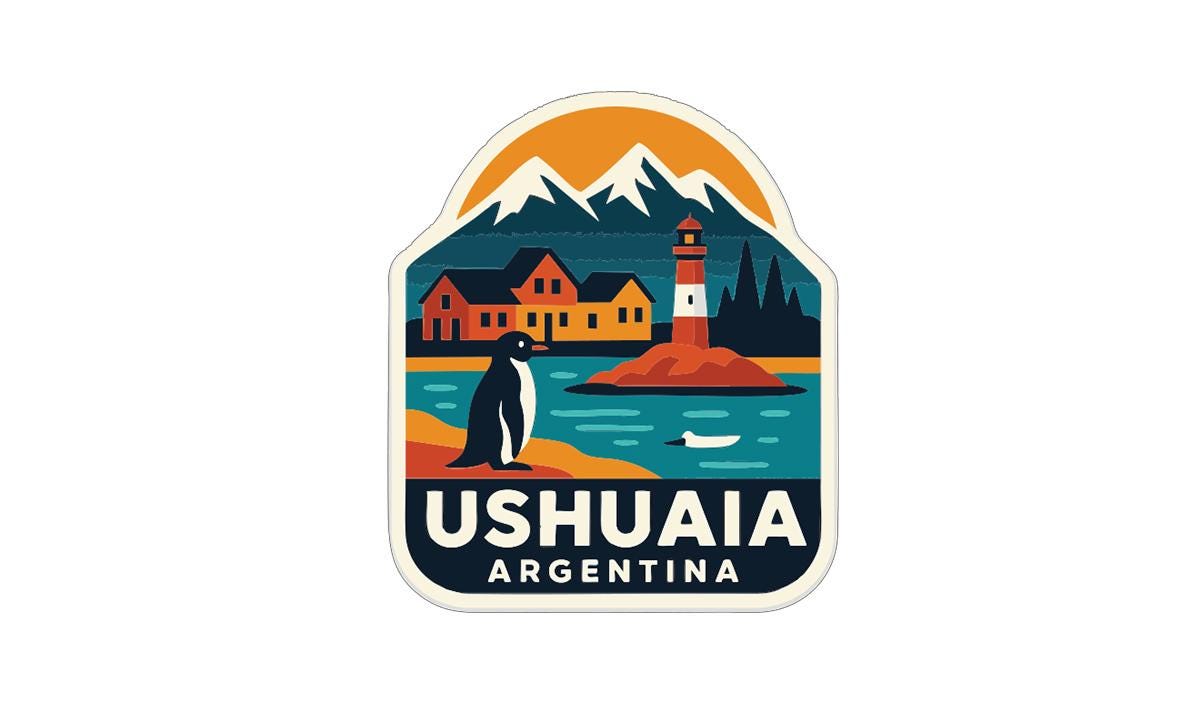 A colorful sticker depicting a penguin, a lighthouse, and a mountain range, with the text "Ushuaia Argentina" prominently displayed.