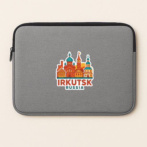 A gray laptop sleeve with a colorful sticker depicting the city of Irkutsk, Russia.