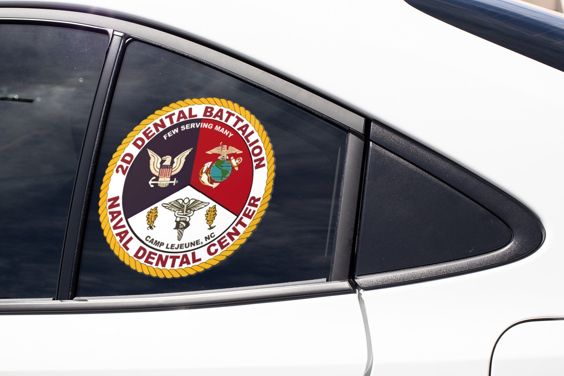 a white car with a sticker on the side of it