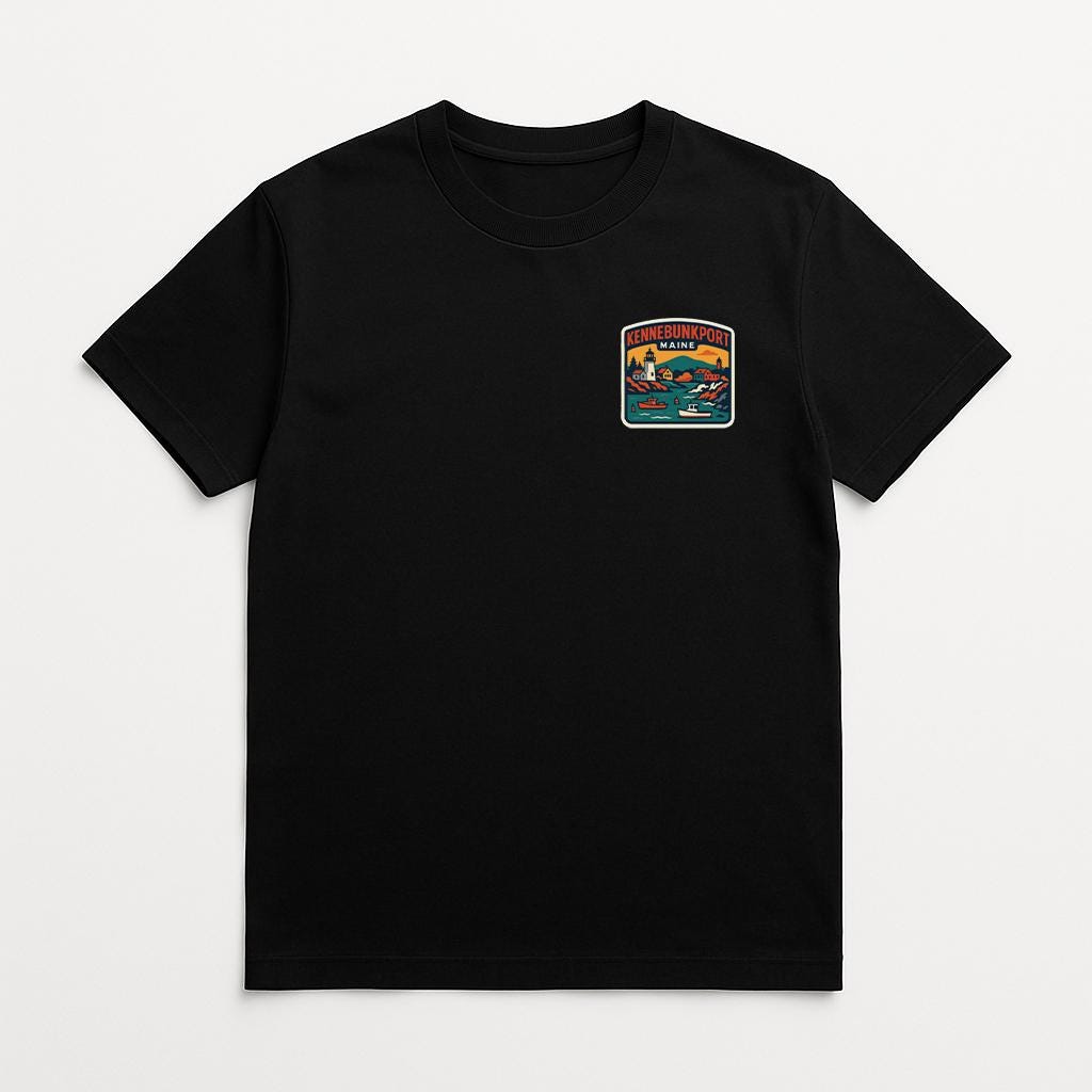 A black t-shirt with a colorful patch on the front.