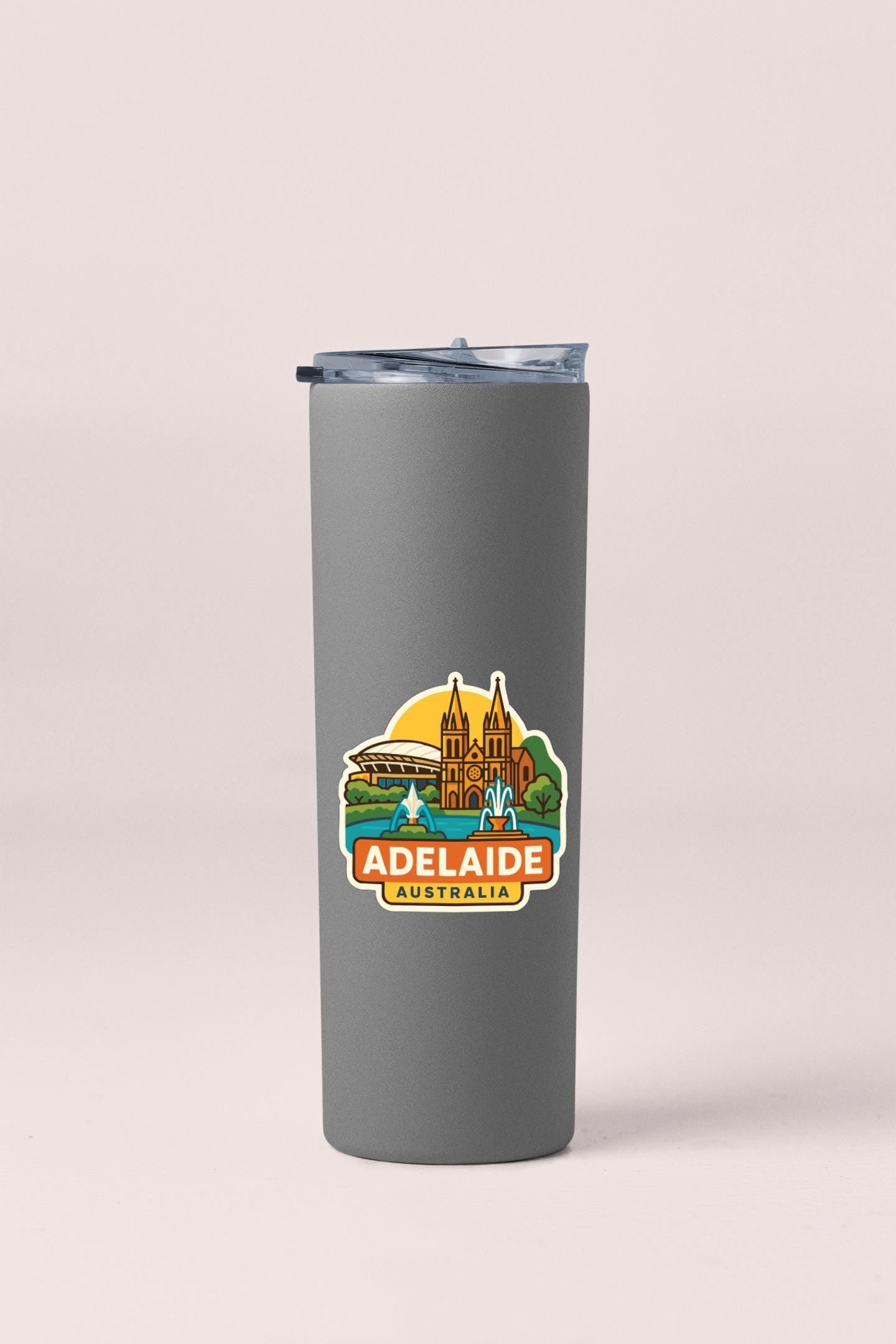 A gray insulated tumbler with a logo depicting the city of Adelaide, Australia.