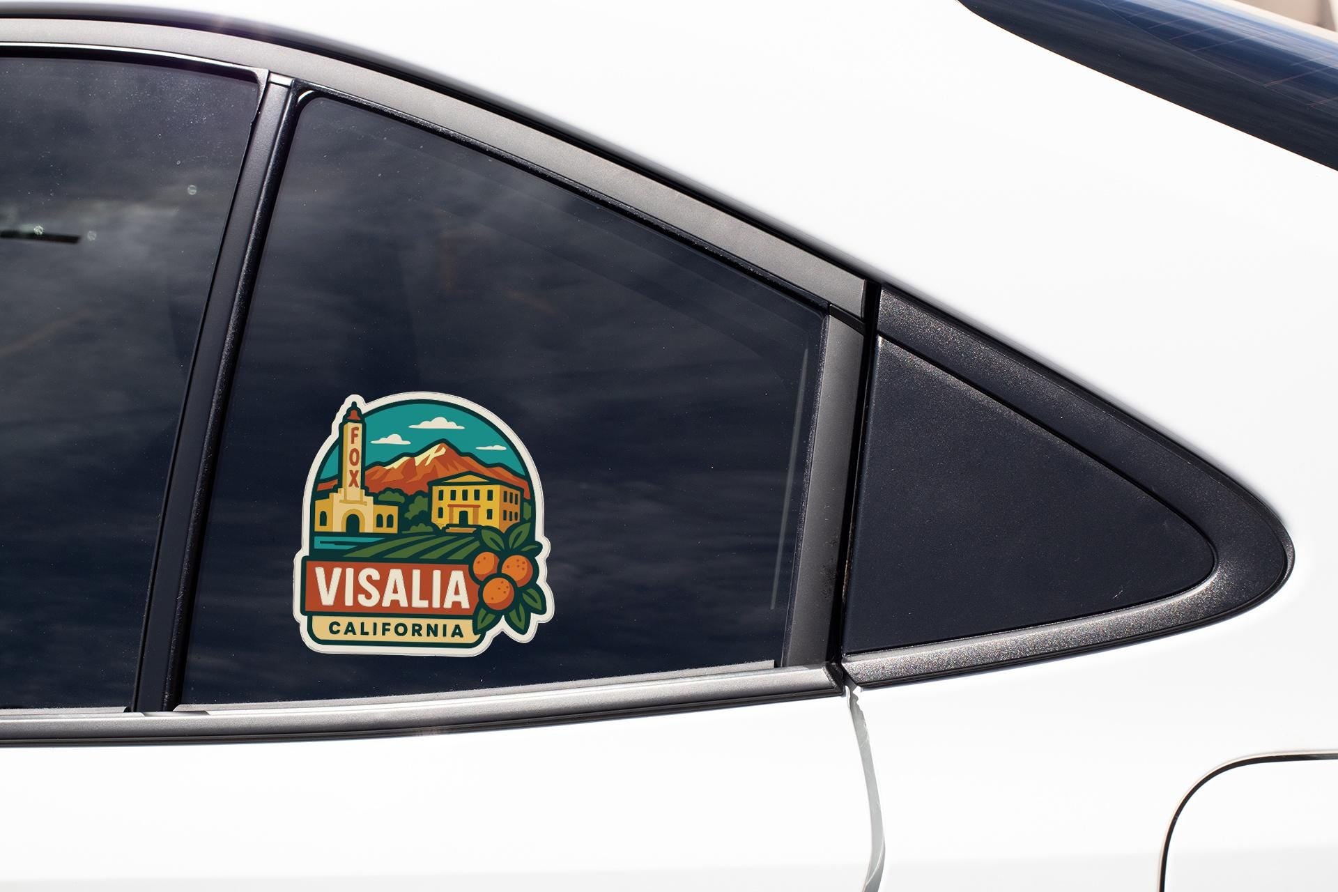 A sticker on the side of a car window that says "VISALIA, CALIFORNIA".