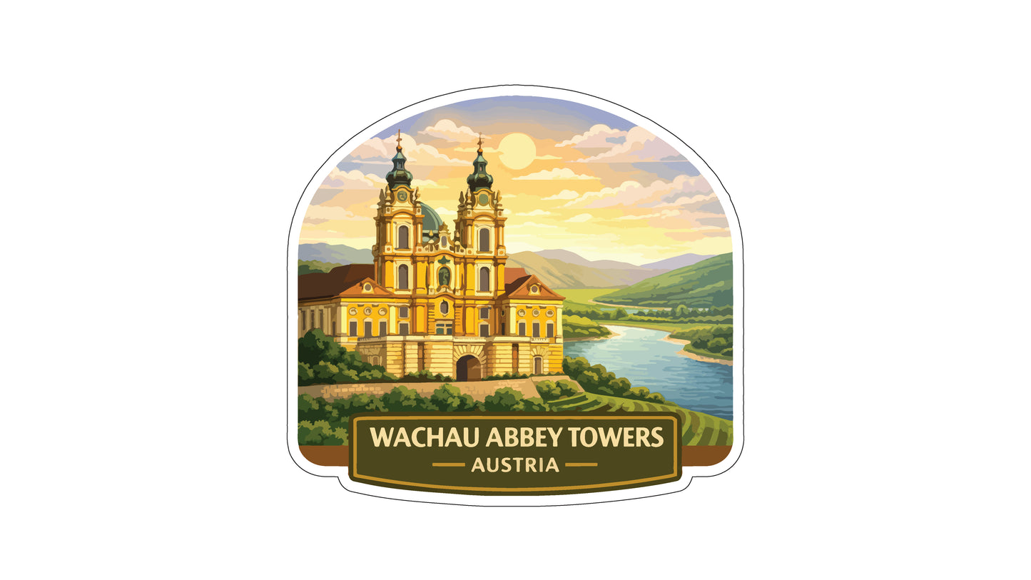 a sticker or label with a painting of the Wachau Abbey Towers in Austria, set against a scenic landscape with a river and mountains in the background.