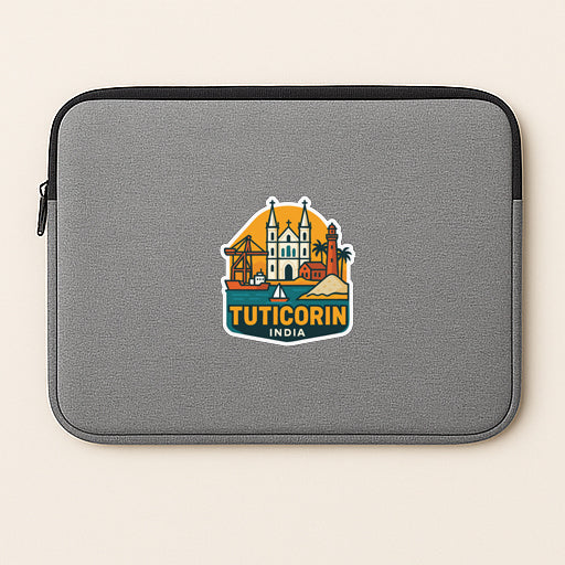 A gray laptop sleeve with a logo of Tuticorn India on it.