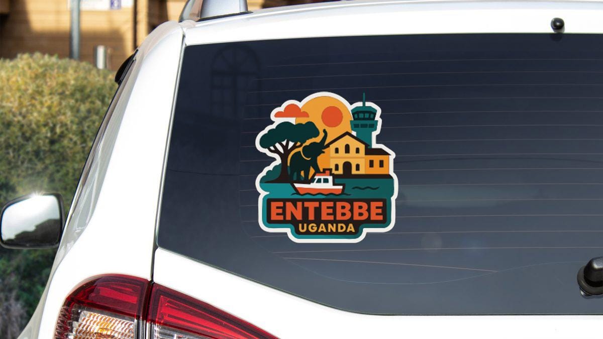 a sticker on the rear window of a car, depicting a scenic view of Entebbe, Uganda.