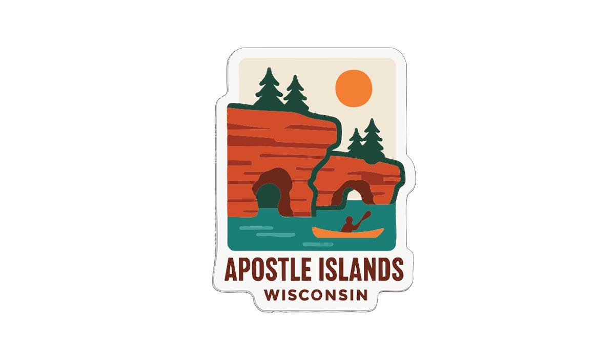 A sticker depicting a scenic landscape with a lake, mountains, and a person kayaking, with the text "Apostle Islands, Wisconsin" below.