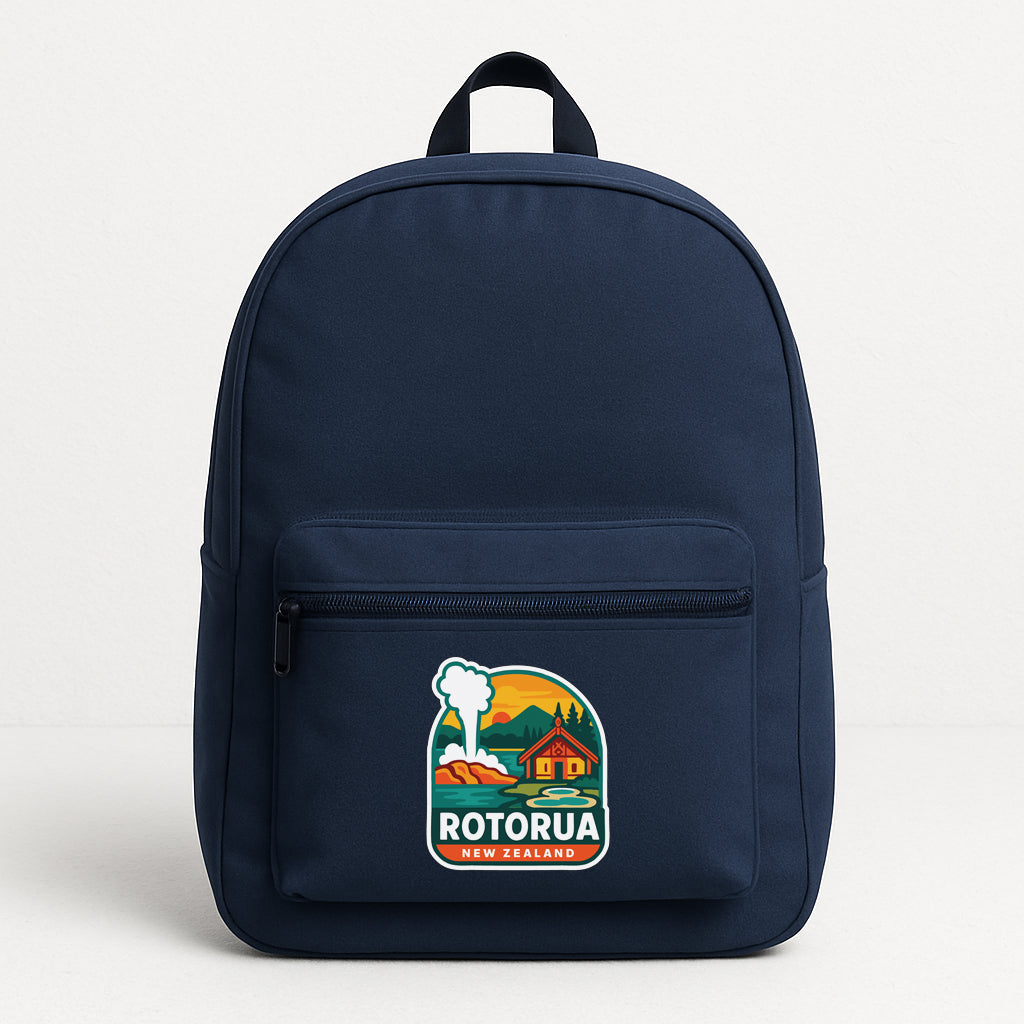 A navy blue backpack with a logo that says "ROTORUA NEW ZEALAND".