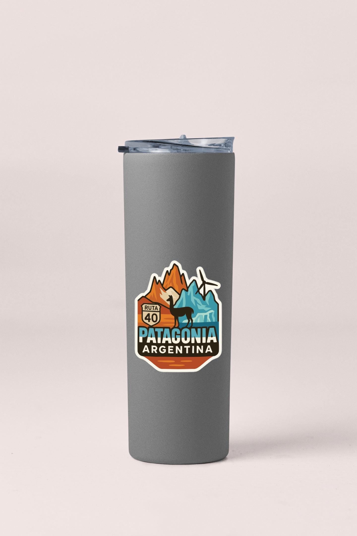 A gray insulated tumbler with a Patagonia logo and text on it.
