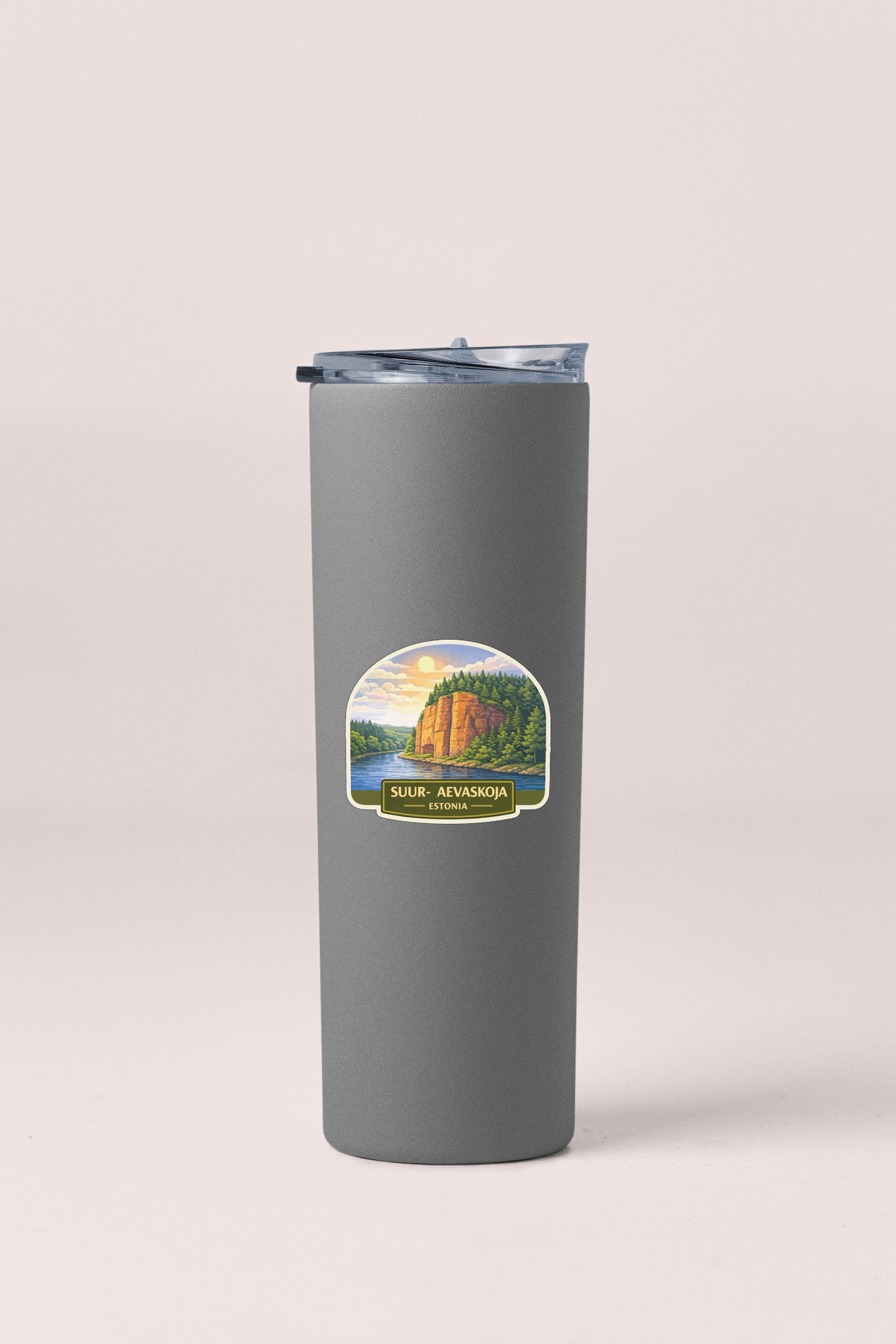 A gray insulated tumbler with a label that says "Sulbir Aevasosoa Estero".