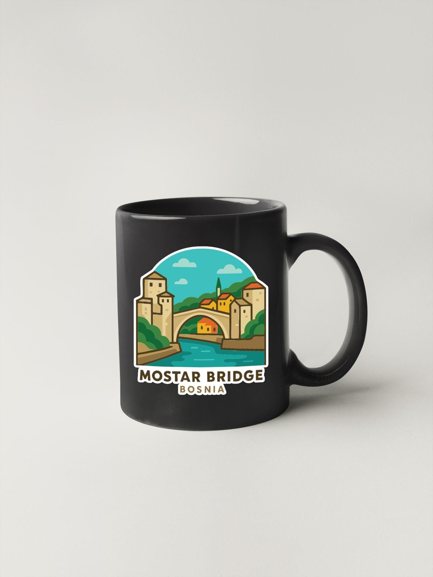 A black coffee mug with a graphic design depicting the Mostar Bridge in Bosnia and Herzegovina.