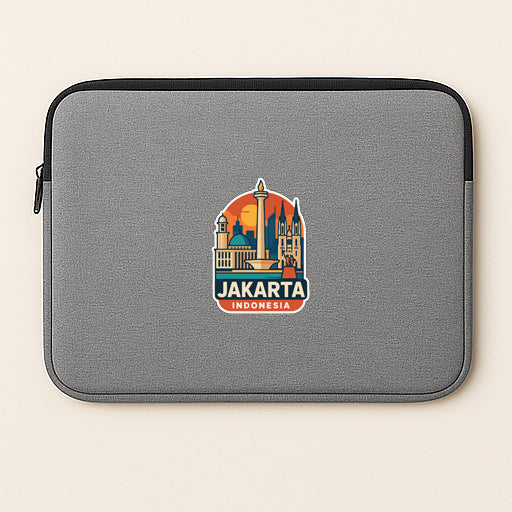 A gray laptop sleeve with a sticker of the Jakarta skyline printed on it.