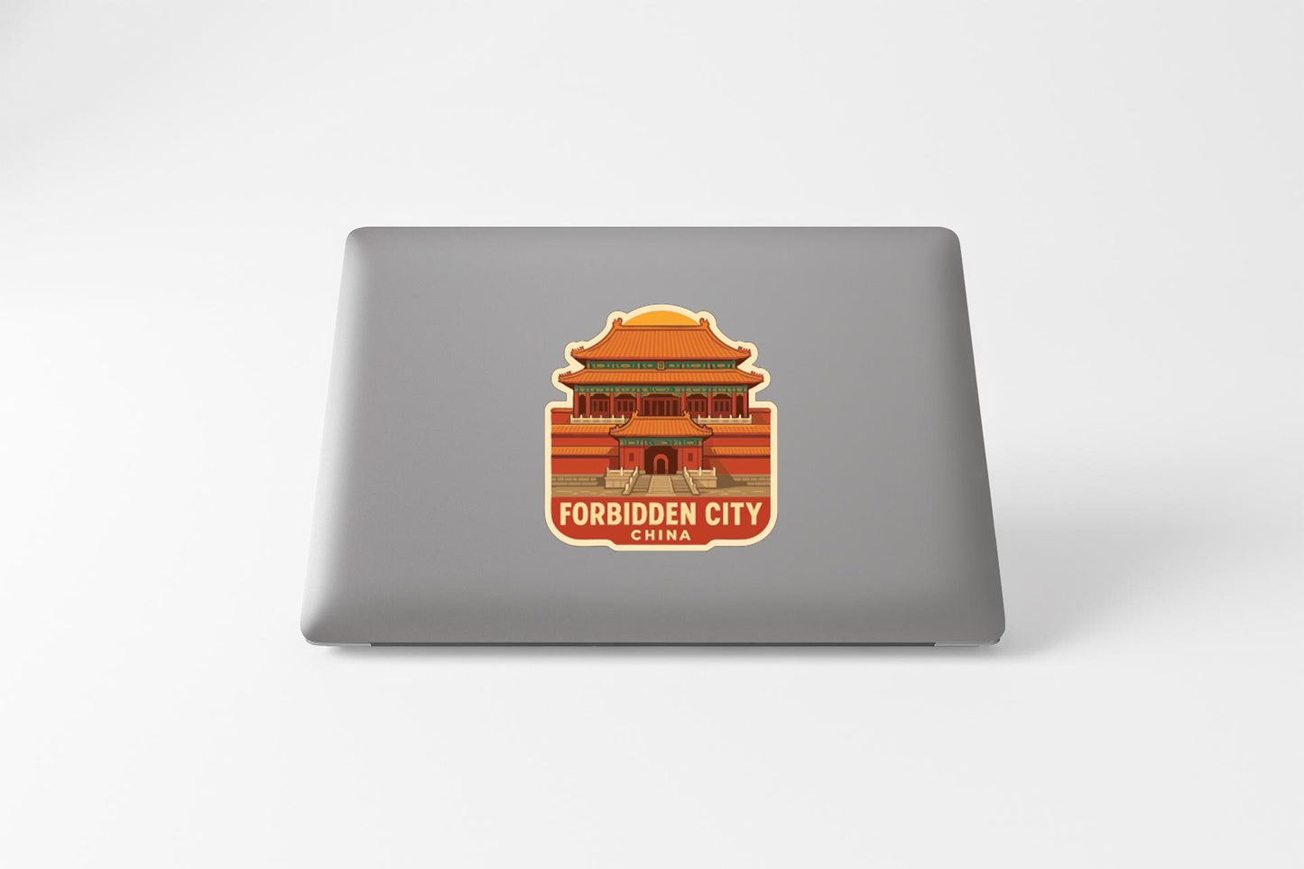 a sticker or decal of a Chinese temple or pagoda, with the text "FORBIDDEN CITY CHINA" prominently displayed on it.