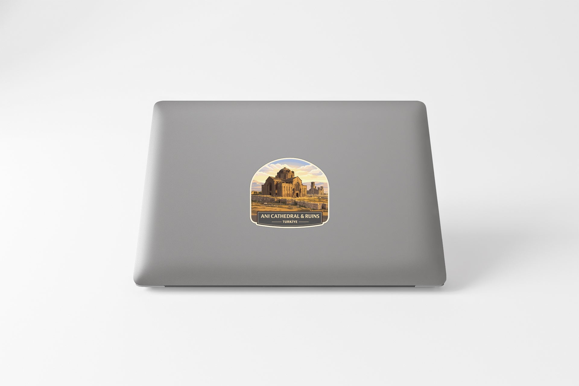 a sticker on the back of a laptop with a picture of a building and the text "AN AMERICAN LIBRARY".