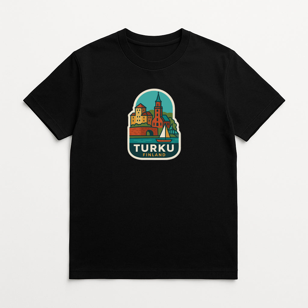 A black t-shirt with a graphic design depicting a cityscape and the text "TURKU TILDE" printed on it.