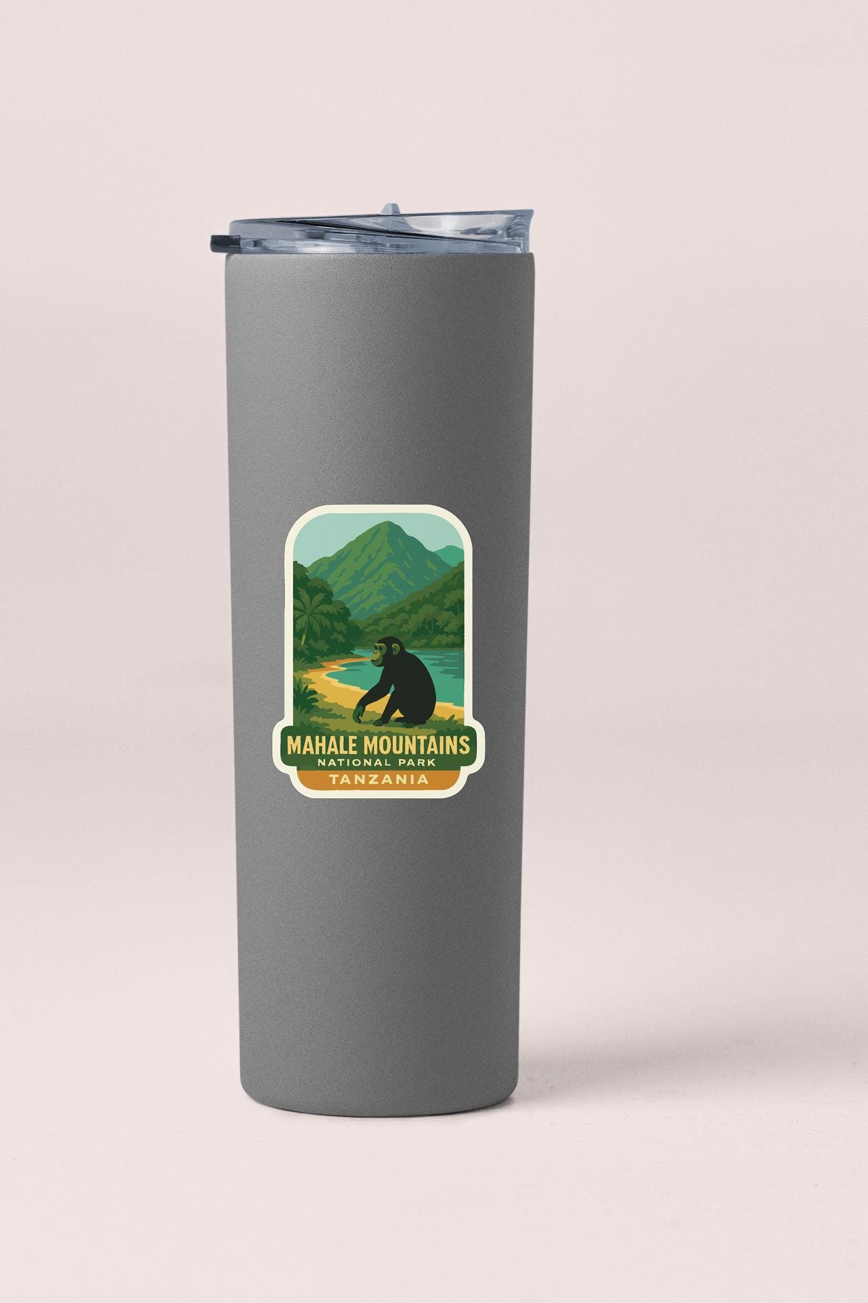 A gray tumbler with a label that says "Mahale Mountains National Park Tanzania" on it.