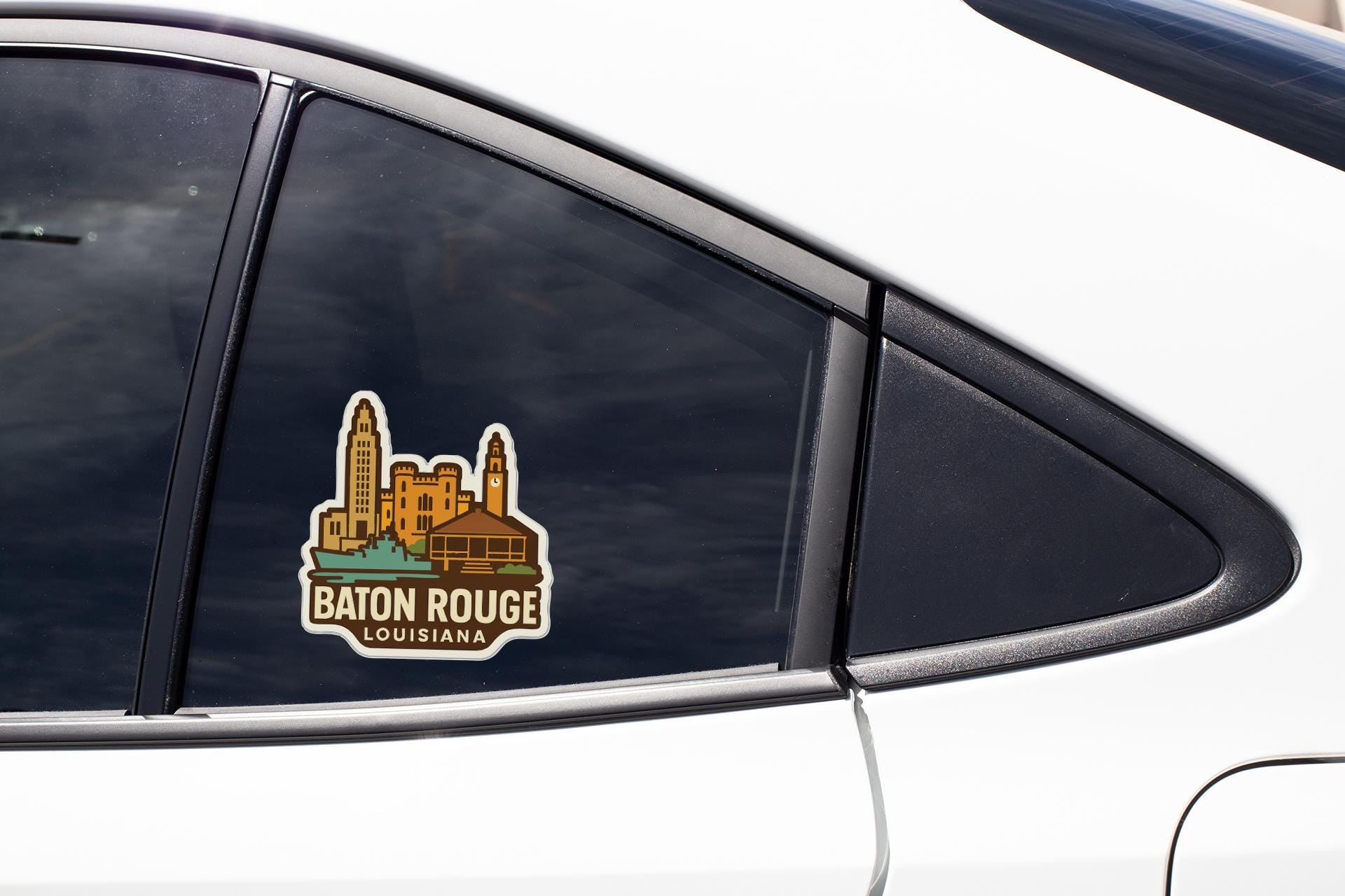 A sticker on the side of a car window, depicting the city of Baton Rouge, Louisiana.