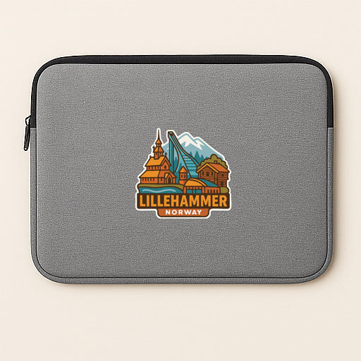 A gray laptop sleeve with a sticker depicting a scenic view of Lillehammer, Norway.