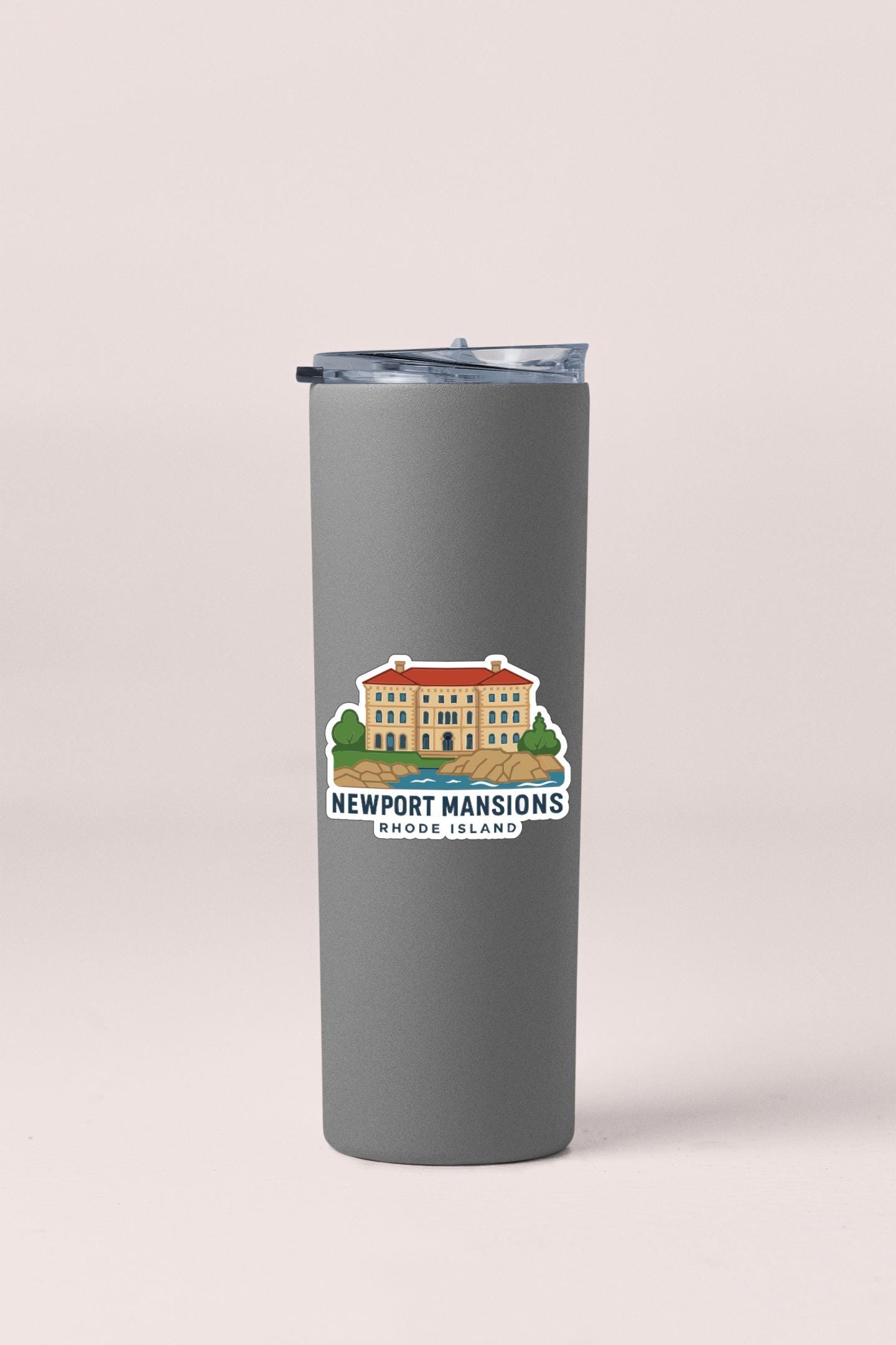 A gray insulated tumbler with a logo for Newport Mansions on it.