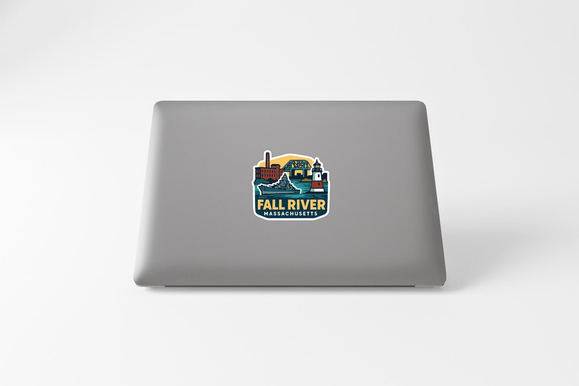 a sticker on the back of a laptop with a colorful illustration and text.