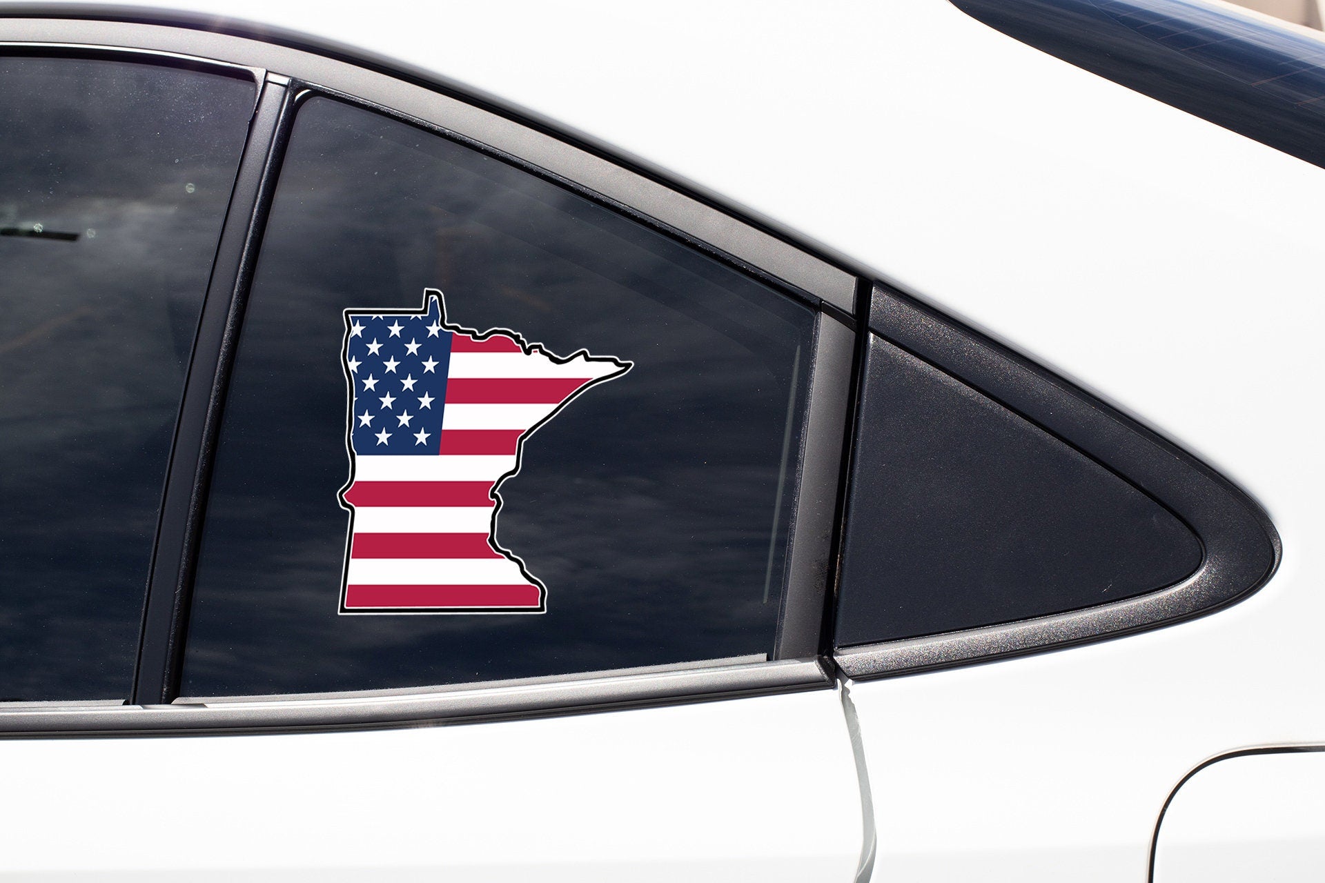 a car with a sticker of the state of minnesota on it