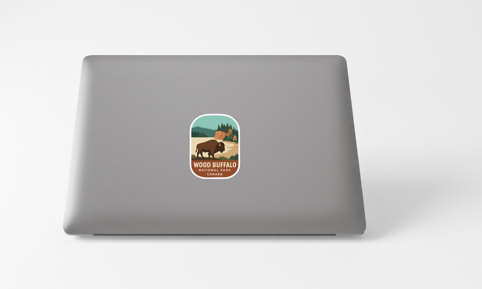 a laptop with a sticker of a horse on it
