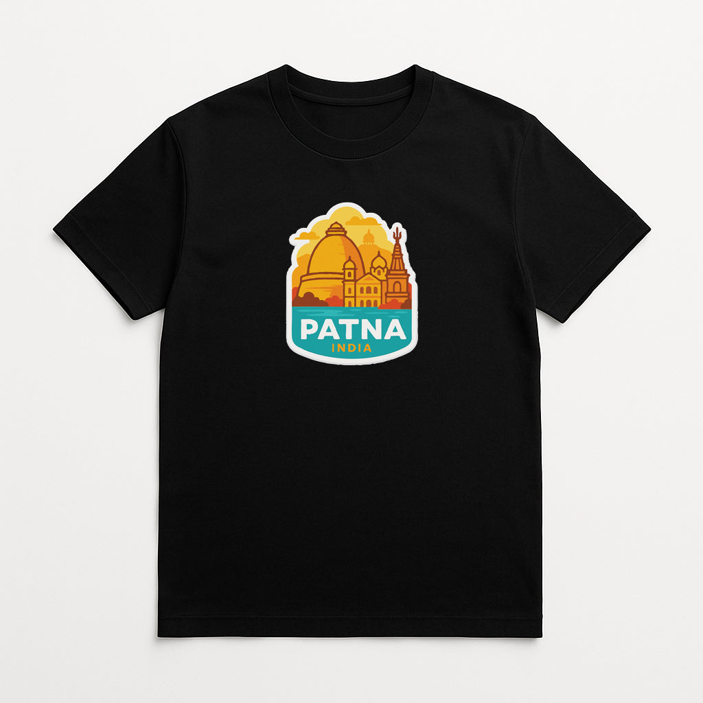 A black t-shirt with a graphic design featuring a stylized illustration of a city skyline and the text "PATNA INDIA" printed on it.