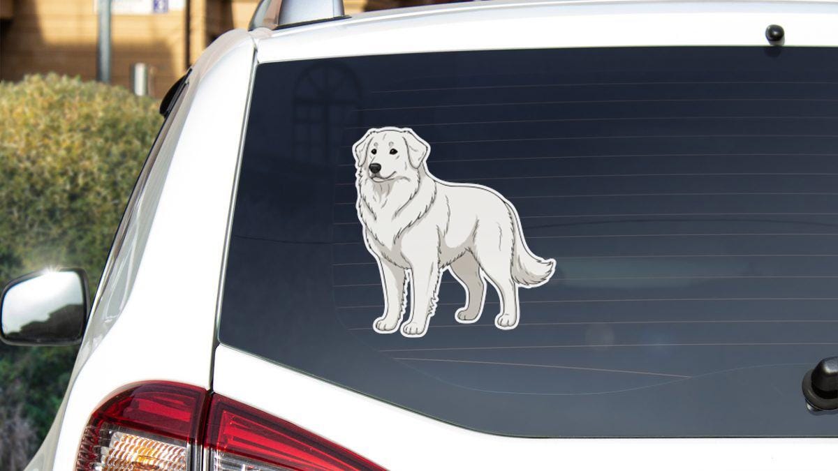 a white dog sticker on the rear window of a car.