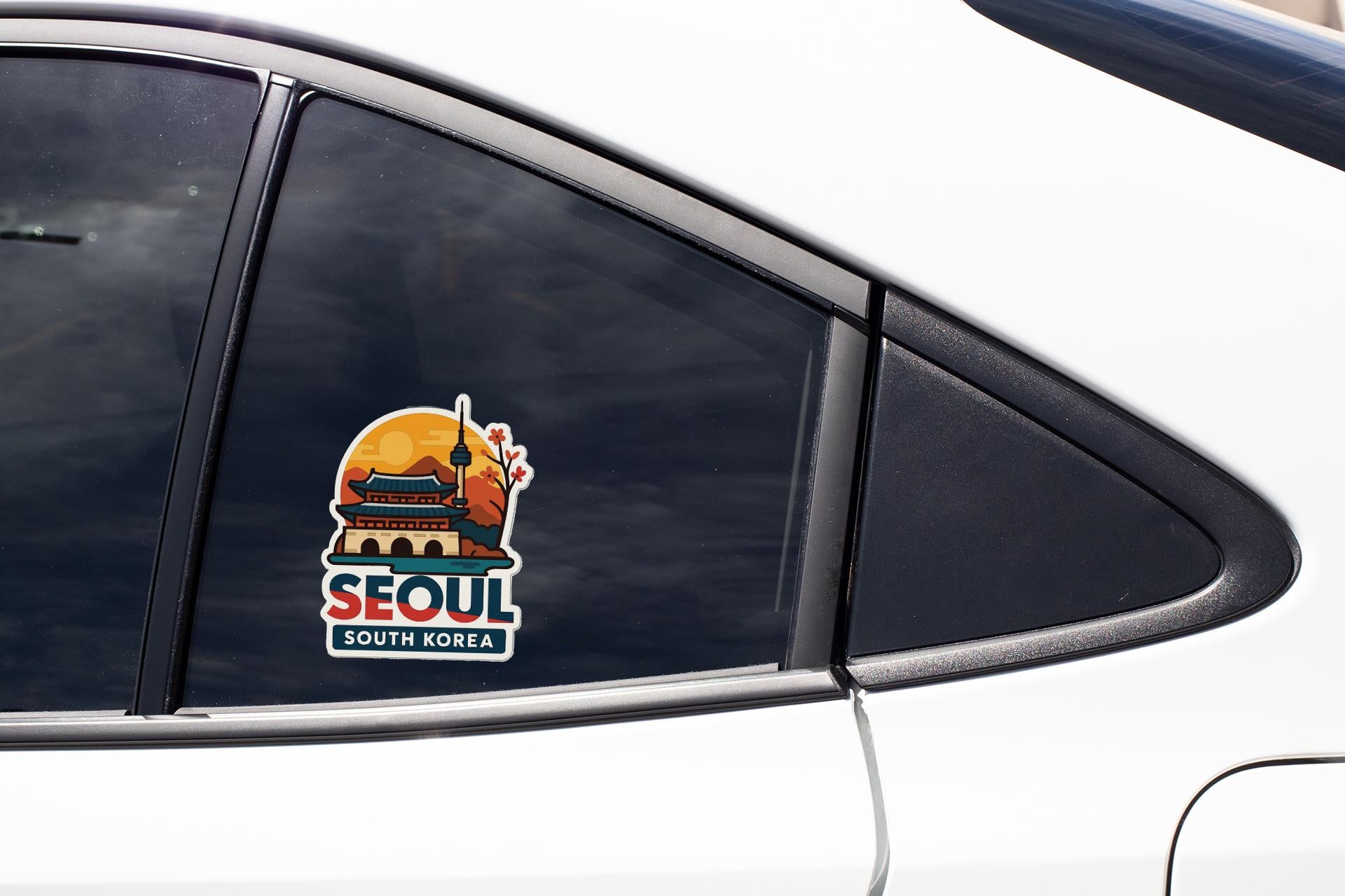 A sticker on the side of a car window, depicting a landmark in South Korea.