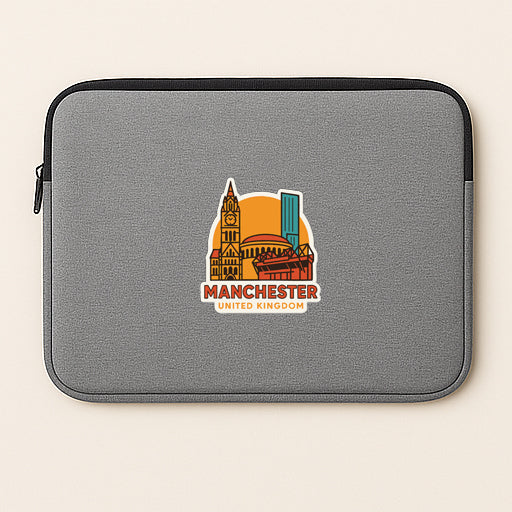 a gray laptop sleeve with a sticker depicting the city of Manchester, United Kingdom.