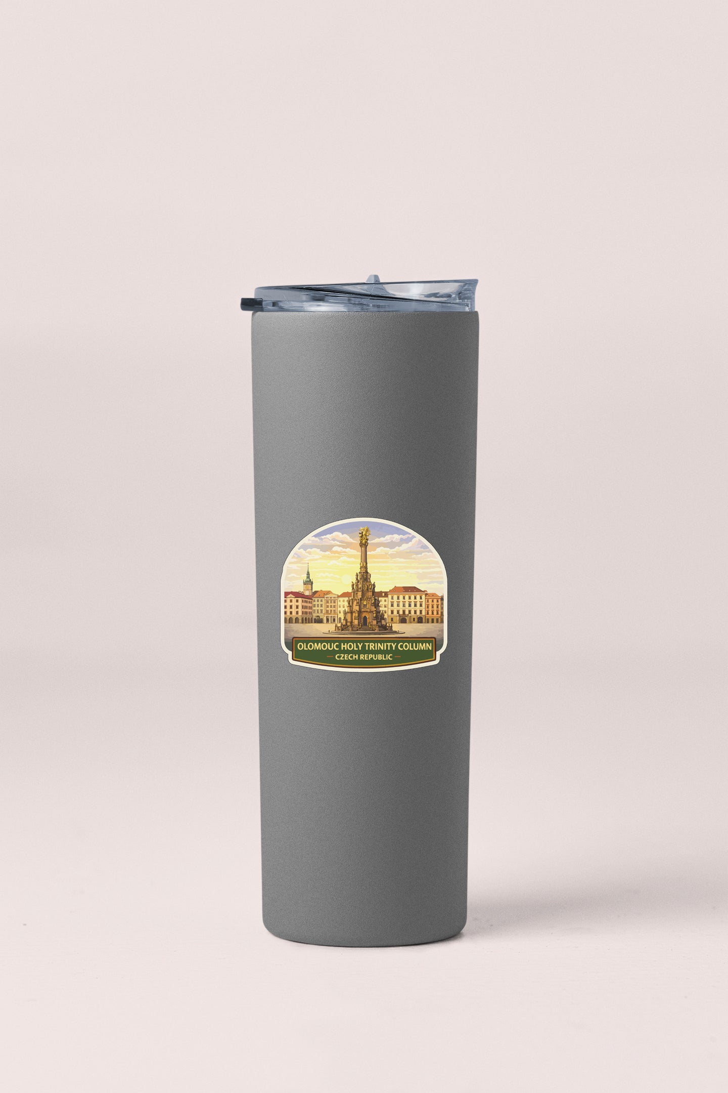 A gray cylindrical thermos with a label featuring an illustration of a city skyline.